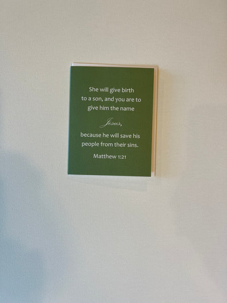 Christian Bible Verse Christmas Card proclaiming the hope Jesus Christ has brought to the world in his birth, life, death, and resurrection. 4.25 x 5.5 inch Christmas Greeting Card featuring Matthew 1:21 from the New International Version of the Holy Bible, printed on Neenah Royal Sundance Cover (felt finish). Blank in the middle, additional devotional thought on the back, white envelope. Only available for sale in the United States.