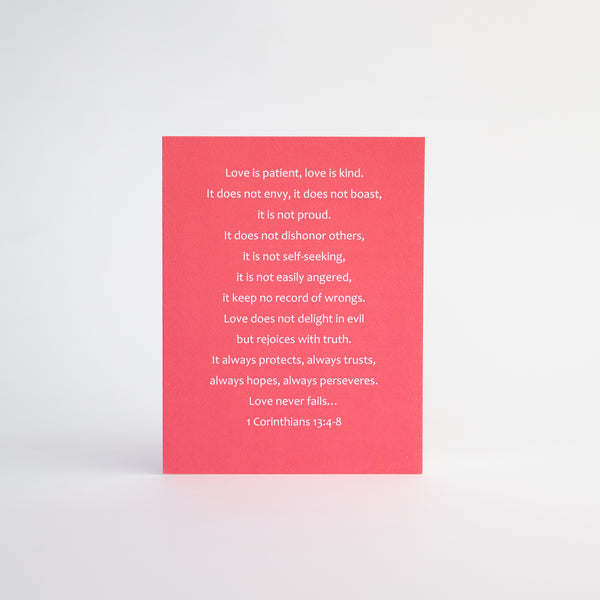 4.25 x 5.5 inch Christian Bible verse greeting card featuring 1 Corinthians 13:4-8 from the New International Version of the Holy Bible printed on Neenah Royal Sundance Cover (felt finish). Blank in the middle, additional devotional thought on the back, white envelope.